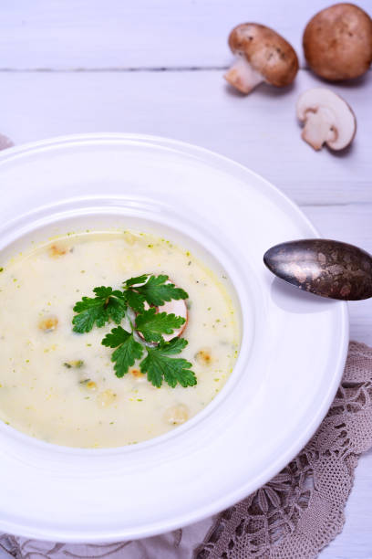 istock Mushroom soup in a white round plate 831571056