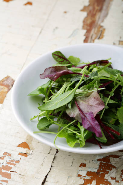 istock Greens in white bowl, healthy ingredients 831571758