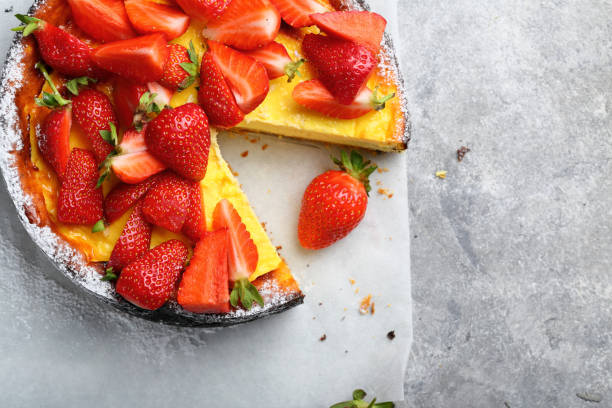 istock Cheesecake top view on concrete, food 831572076