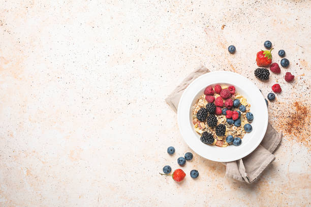 istock homemade oatmeal with berries 831582476