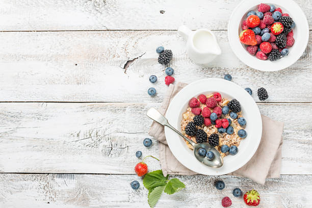 istock homemade oatmeal with berries 831584610