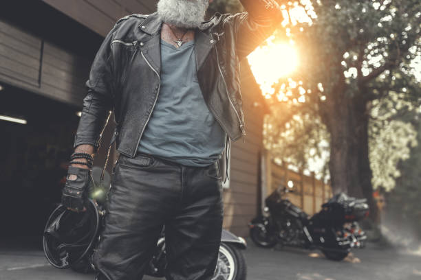 istock Bearded old man near garage 831585182