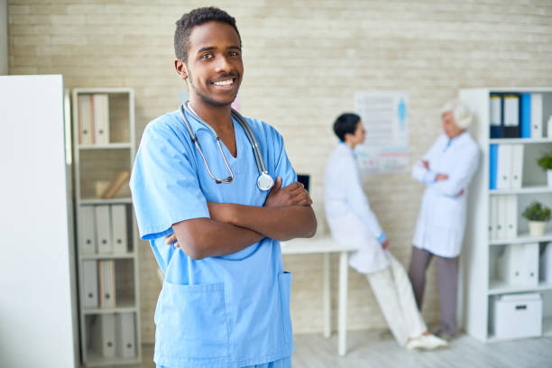 istock Successful African surgeon in doctors office 831585474