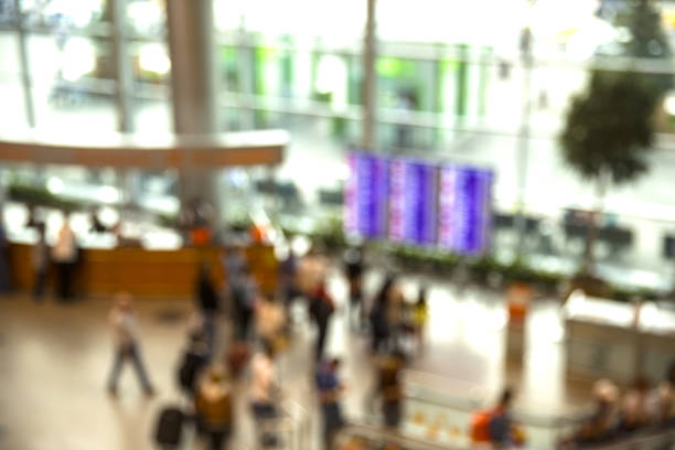 istock Blurred people in the main lobby at Airport 831586808