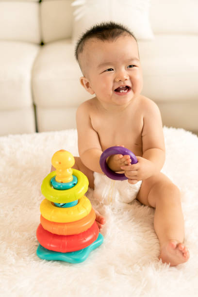 istock Baby playing toys 831589216