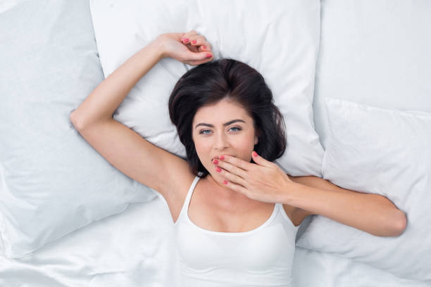 istock Young Woman Wake Up Concept 831590128