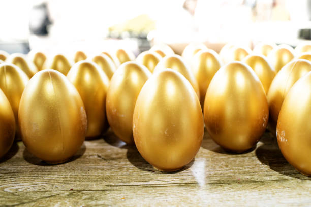istock Easter eggs from gold in the basket 831601578