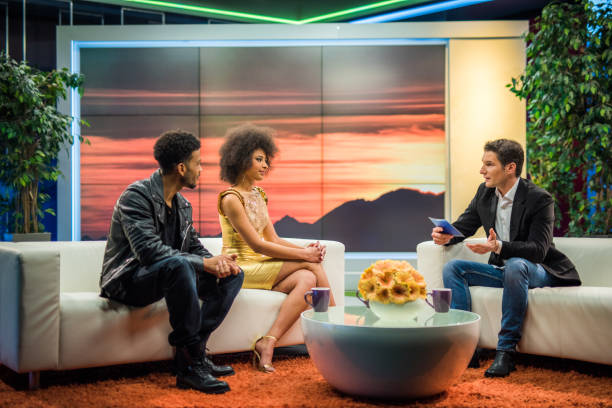 Celebrity talk show Celebrities being interviewed by talk show host at television studio. leather clasp stock pictures, royalty-free photos & images