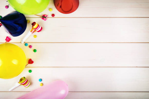 istock colorful birthday party items with copy space. top view 831605128