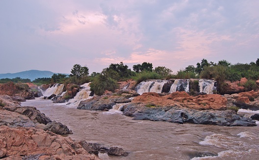 A waterfall in the light of the twilight hour on the mighty Usuthu river in rural Swaziland