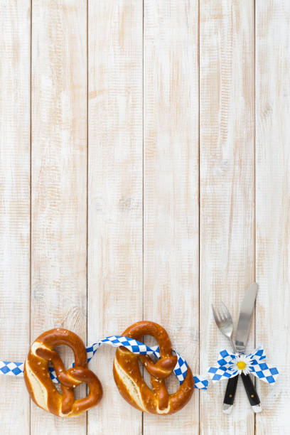 Beer Fest background with pretzels and cutlery