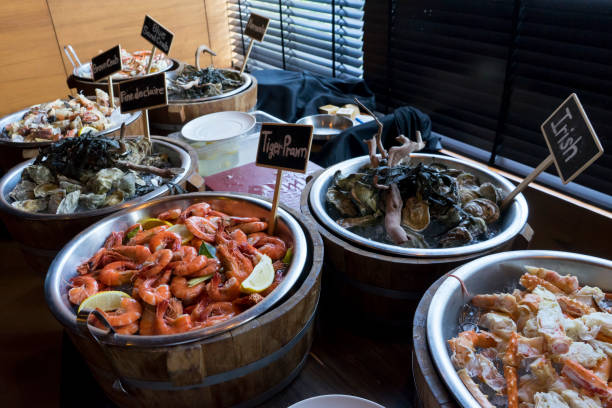 istock alaskan king crab oysters irish tiger prawn and lemon on ice 831618916