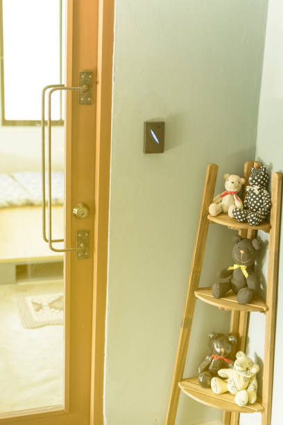 istock vintage Door Handles on wood mirror with locking modern style with access control for scanning key card to pass to room 831619664