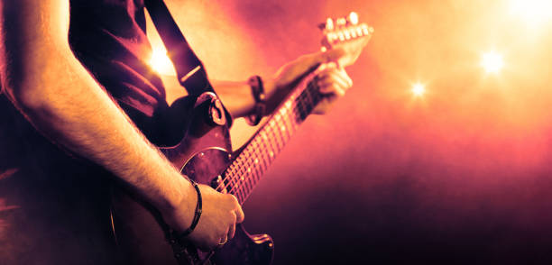 istock Guitarist playing a guitar, close-up 831622532