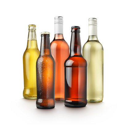 group shot of a variety of alcohol bottles on white background