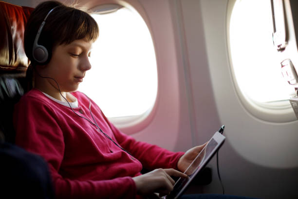 istock Beautiful girl enjoy a relaxing flight 831622948