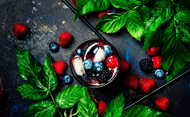 istock Cocktail with vodka, berry juice and ice, top view 831635050