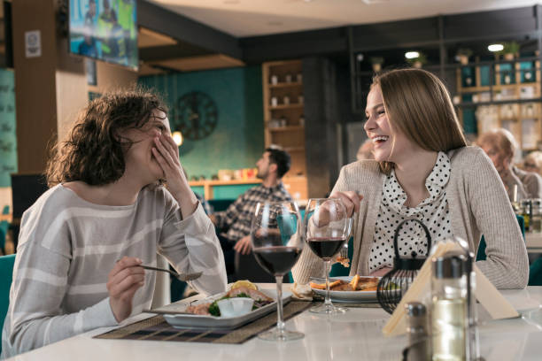 istock Two woman on diner eating and talking in restaurant 831638048