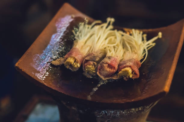 Vietnamese grill. Grills and bacon on the grill. Street Cafe.