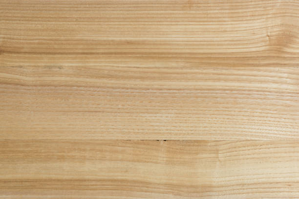 istock full frame of light brown textured wooden background 831639086