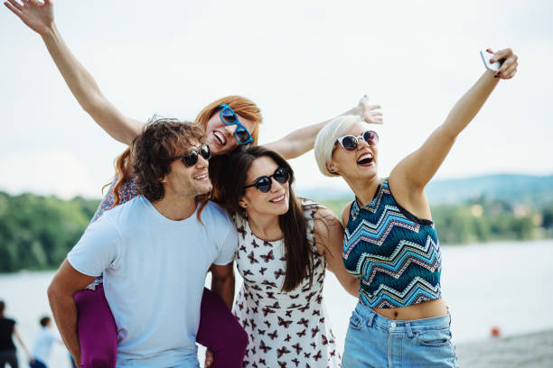istock Selfie on the beach party 831639408