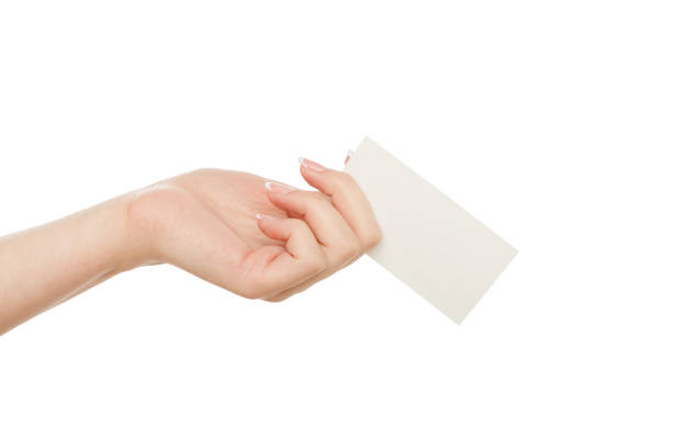 istock Female hand holding blank card for text message, crop, cut out 831639710