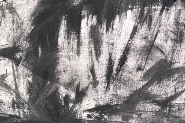 istock Wooden board with smears of  black paint 831640106