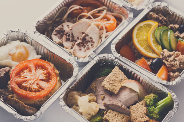 istock Healthy food take away in boxes on white background 831644116