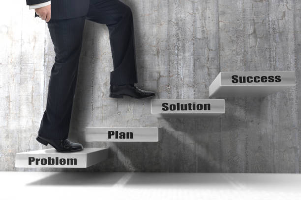 istock Businessman taking steps to success 831644244