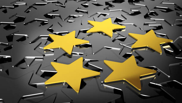 istock Five gold stars on black stars 831644440