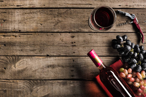 istock bottle of wine, wineglass and grapes 831644500