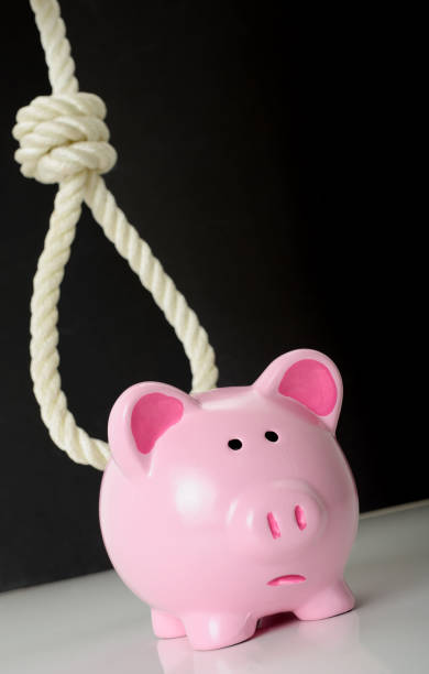istock Concept of finacial problems a piggybank 831645152