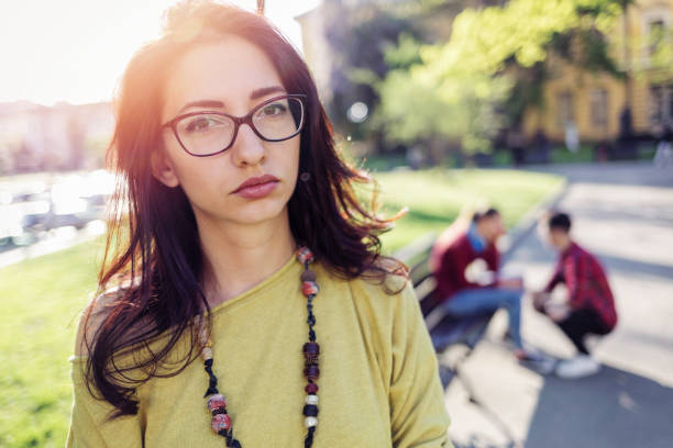 istock Unhappy girl looking at camera 831648266