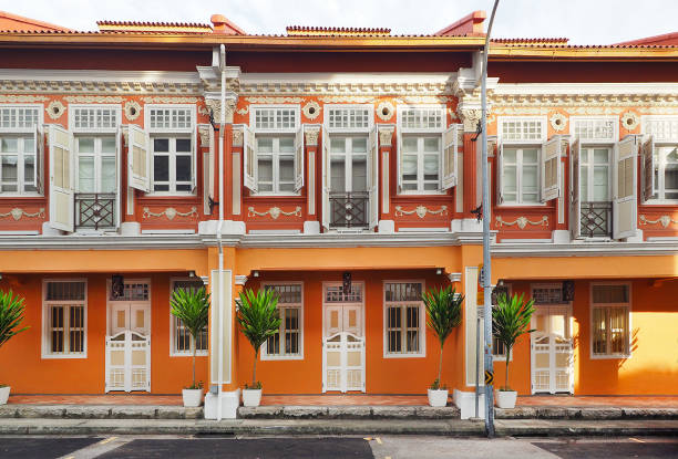 Singapore local vintage buiding with orange color theme in Chinatown Singapore stock photo