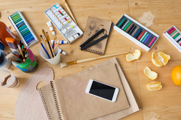 istock Colorful workplace of creative person 831651446