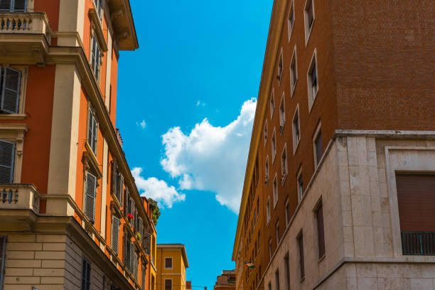 istock red facaded buildings next to each other 831659256