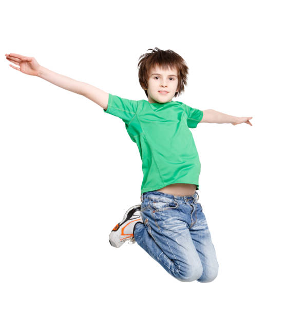 istock Happy laughing boy jumping on white isolated background 831659276