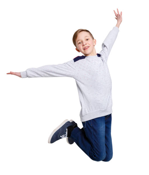 istock Happy laughing boy jumping on white isolated background 831659354