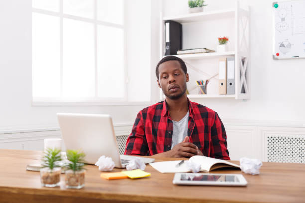 istock Young black man enjoying his successful business 831661886