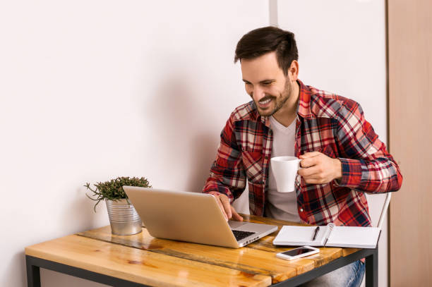 istock Entrepreneur working with a laptop in home office 831664914