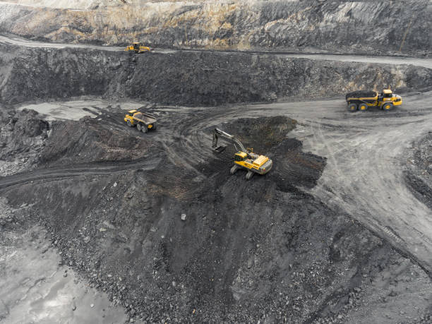 istock Aerial view open pit mine, loading of rock, mining coal, extractive industry 831664918