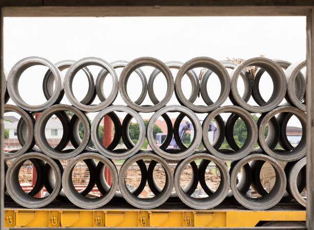 Concrete drainage pipes for industrial building construction.Isolated on white background.