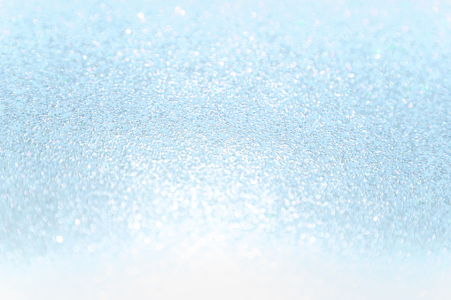Close up soft blue Paper Glitter bokeh abstract background