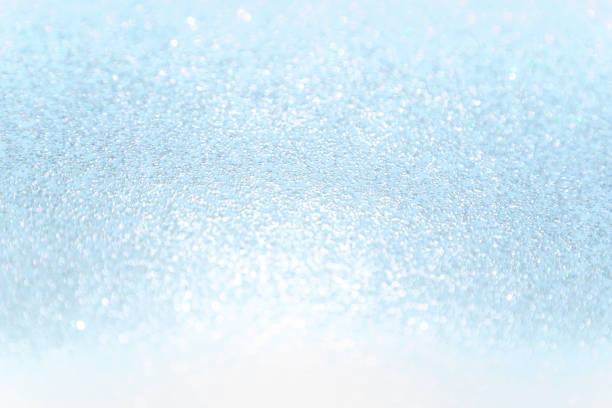 Close up soft blue Paper Glitter bokeh abstract background stock photo