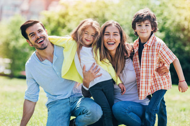 istock Beautiful family outdoors at sunlight 831679768