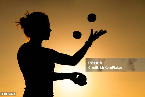 Woman Juggler Stock Photo - Download Image Now - Juggling, Women, One Woman Only