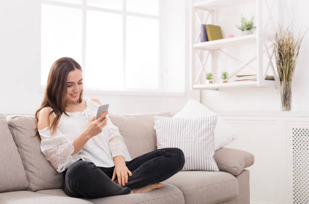 istock Girl at home chatting online 831684902