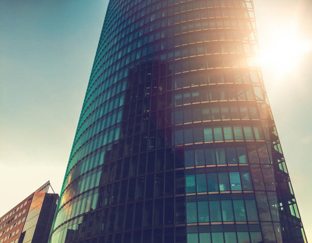 istock beautiful and modern glass skyscraper with high contrasts 831688238