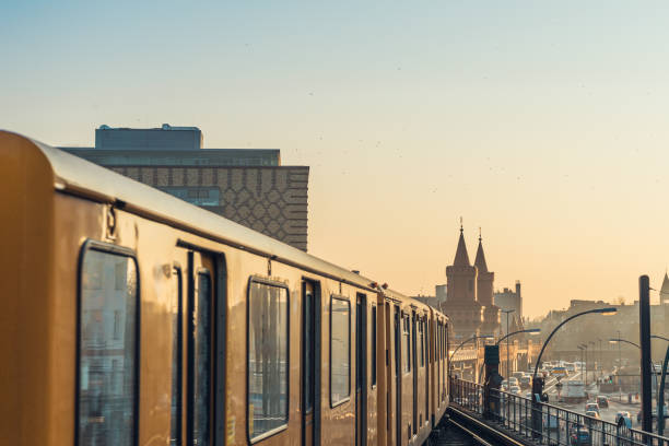 istock Commuter train on tracks in European city 831693730