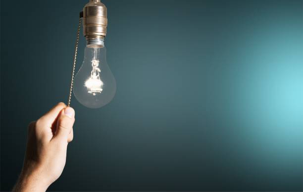 switch. - alternative energy data fuel and power generation light bulb - fotografias e filmes do acervo